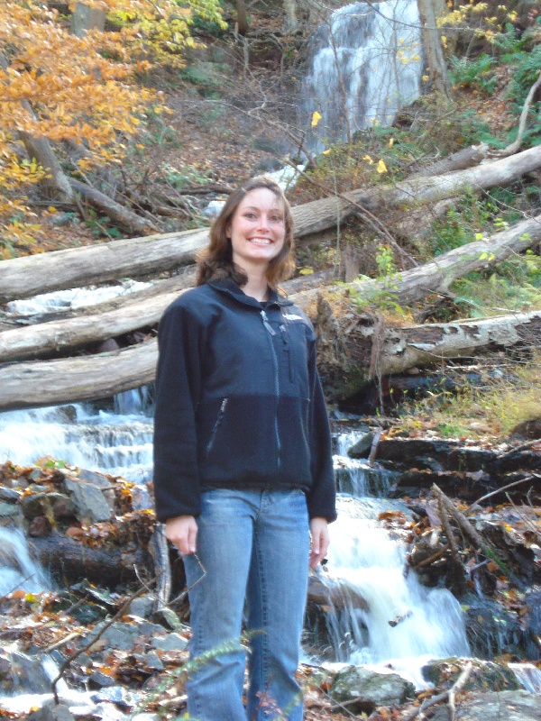 Kristen in front of the same falls.